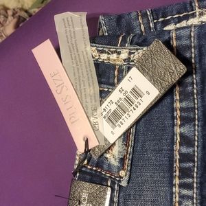 Never worn they are too small now